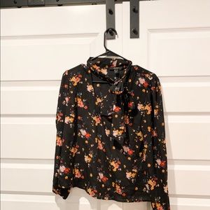 Black floral long sleeve top with bow collar